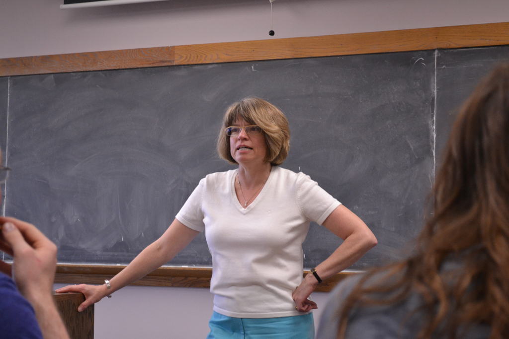 Donna Ginther talking with hand on hip