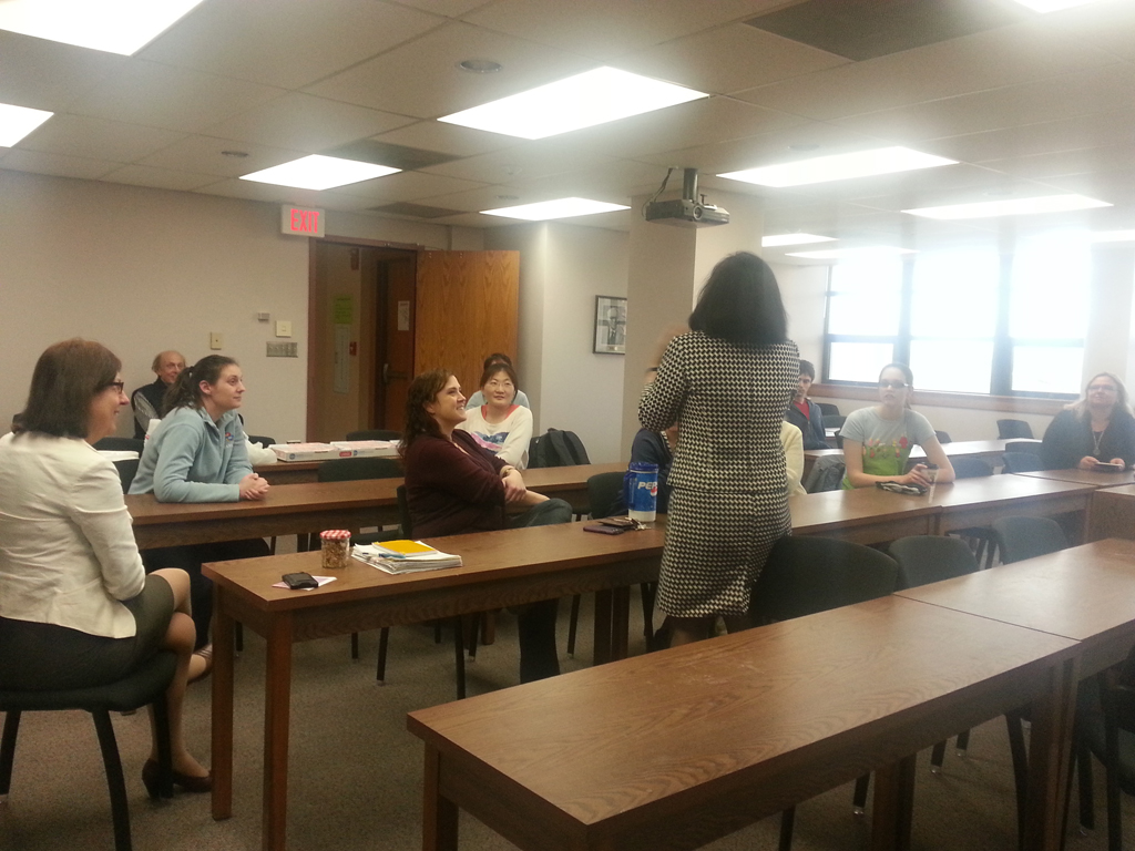 Neeli giving talk in front of class