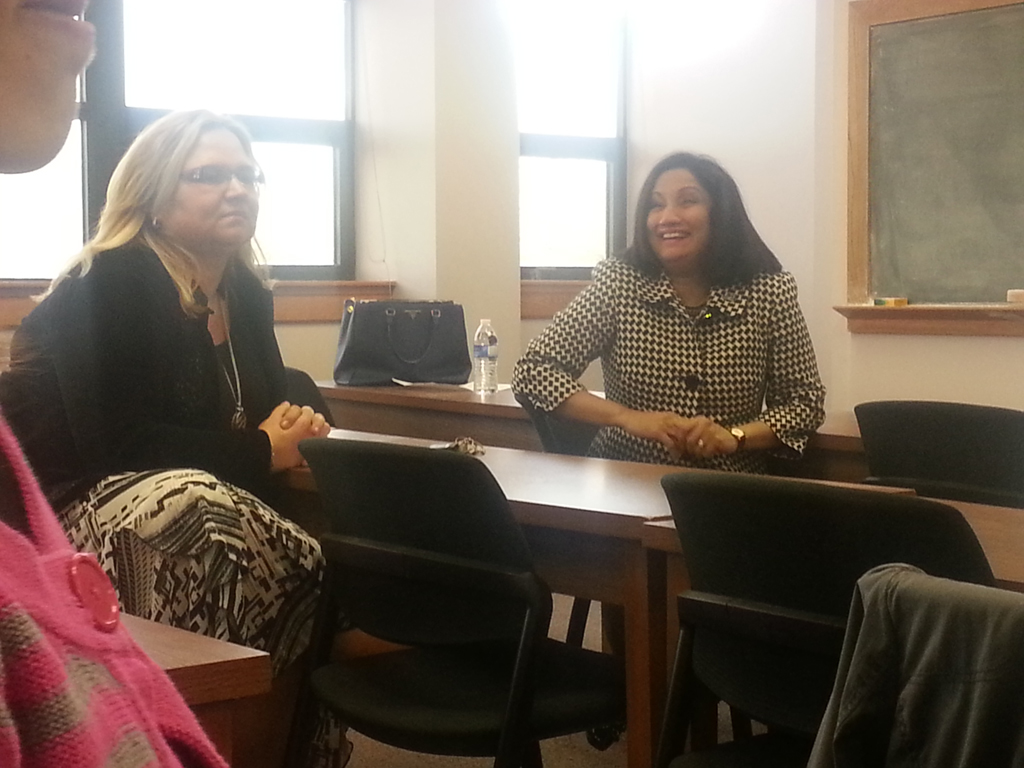 Neeli laughing with female student