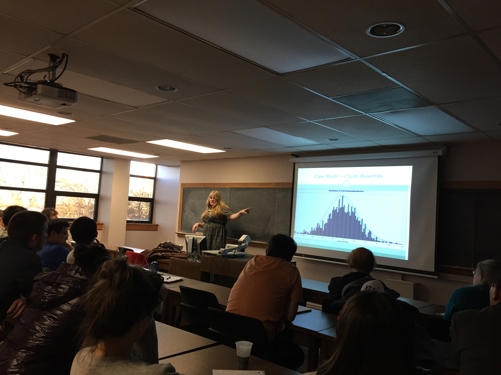 Melissa Boudreau listening to male speaker